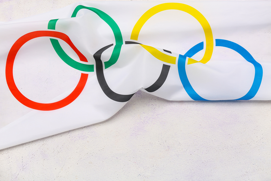 Olympic Flag on White Background, Closeup