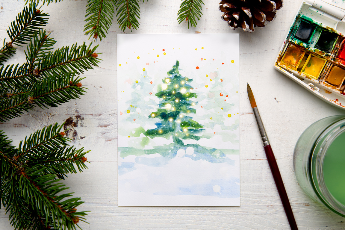 Painting a watercolor Christmas card at home